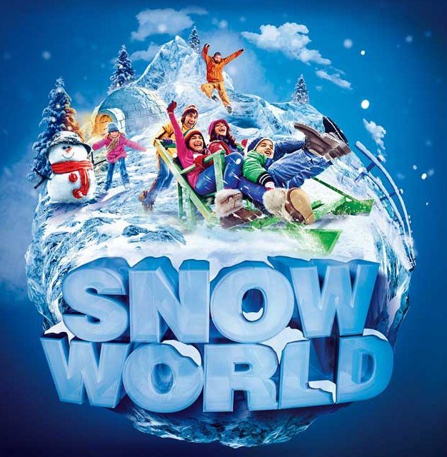 Snow World: families sledging on a snowy globe